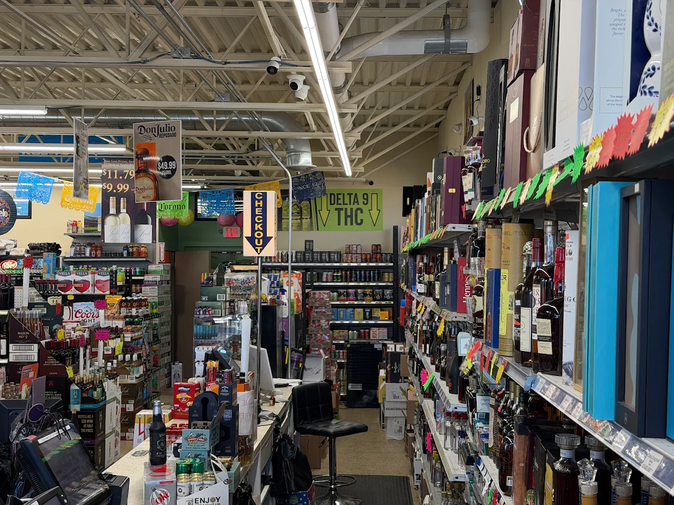 Store interior showing full beer and spirits selection
